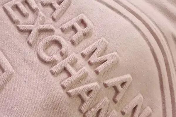 custom embossed embroidery made by habit fit sports in Sialkot Pakistan