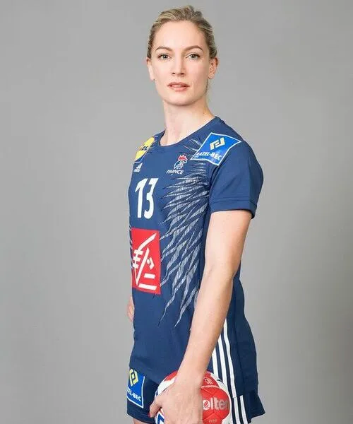 female wearing custom handball uniform