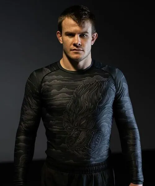 male wearing custom rash guard in black color