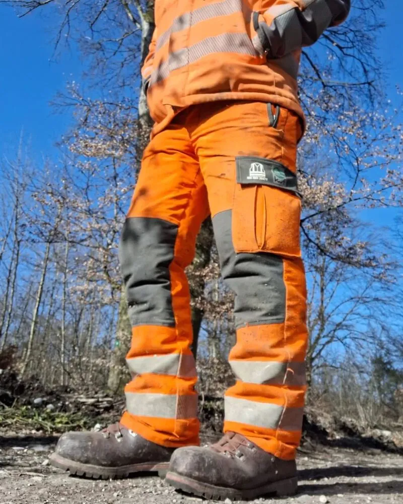 male wearing orange custom hi vis cargo trousers