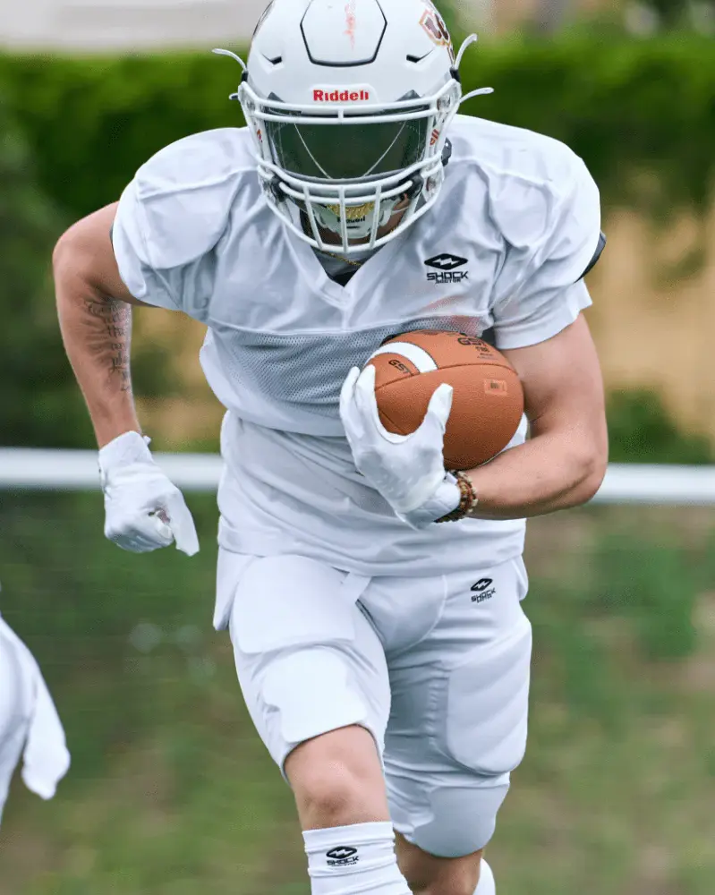 player wearin custom white american football uniform 1