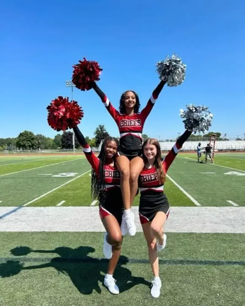 3 female wearing custom cheerleader uniforms 1