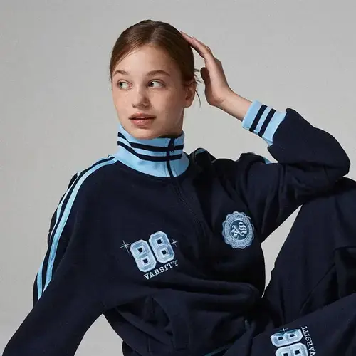 girl wearing tracksuit in navy blue color