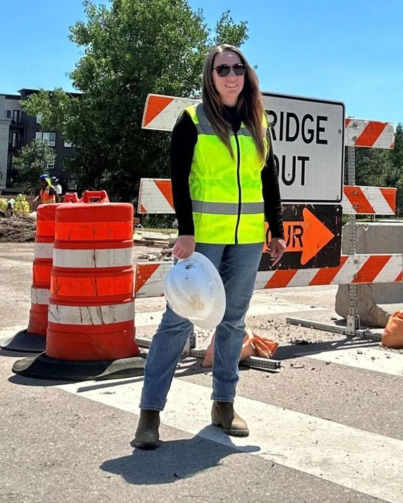 female wearing hi vis safety vest in yellow color