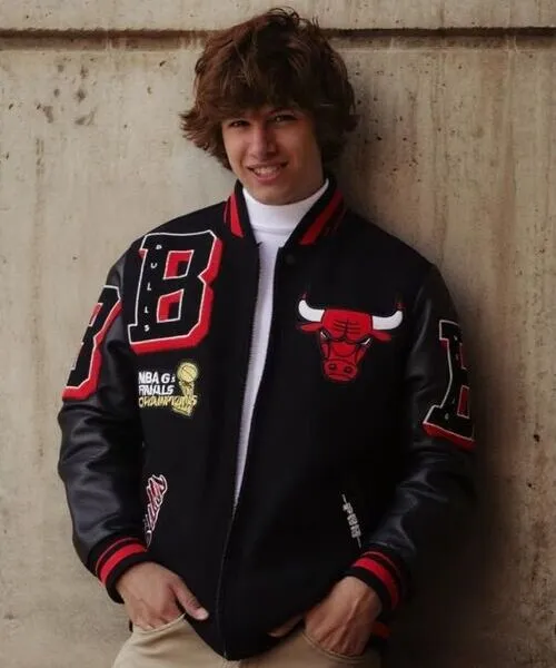 male wearing letterman jacket