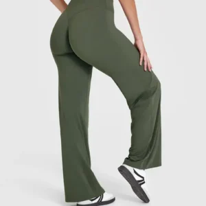 model wearing oversized leggings in olive green color