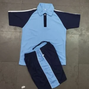 A junior-sized sports kit featuring a sky blue polo shirt with navy blue sleeves and collar, paired with matching navy blue athletic shorts.